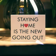 happy birthday greeting card on brown wooden table related to Enhancing Your Home with Hard Window Valances