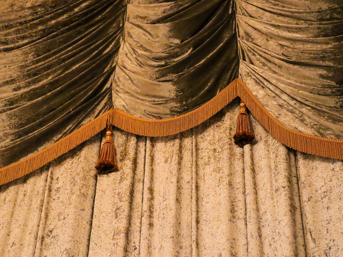 Heavy, textured curtains with decorative trim. related to Penneys Curtains and Valances Options