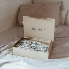 https://loveinabox.co.za/ related to Snuggle Up! The Ultimate Guide to Mini Crib Bedding
