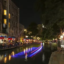Iconic area of San Antonio, especially at night. Lights in the middle are the boats moving along the river. related to Warm Up Your Nights with a Chiminea in San Antonio