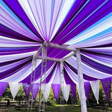 Image of a purple and white tent with a blue sky in the background related to Elegant Purple Valances to Enhance Your Bedroom Decor