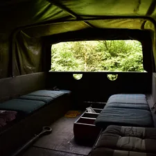 In the back of an army vehicle (Army - Dick van Waert collection) related to Classic Swag Valance: Timeless Elegance for Your Home