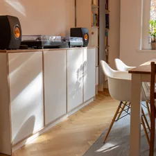 Individual multiplex sideboard in a living room. The furniture is used for the sound system. related to Elevate Your Living Room with the Perfect Sideboard