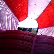 inside a red and white balloon related to Creating a Beautiful Balloon Valance Curtain