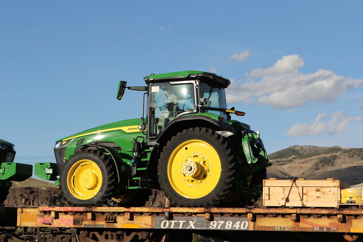 John Deere tractors on a train car in Pocatello, Idaho. related to Riding into Dreamland: The Coolest John Deere Tractor Bed