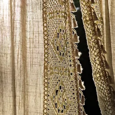 Lace edged curtain with tassels, backlit related to Lace Valances Window Treatments