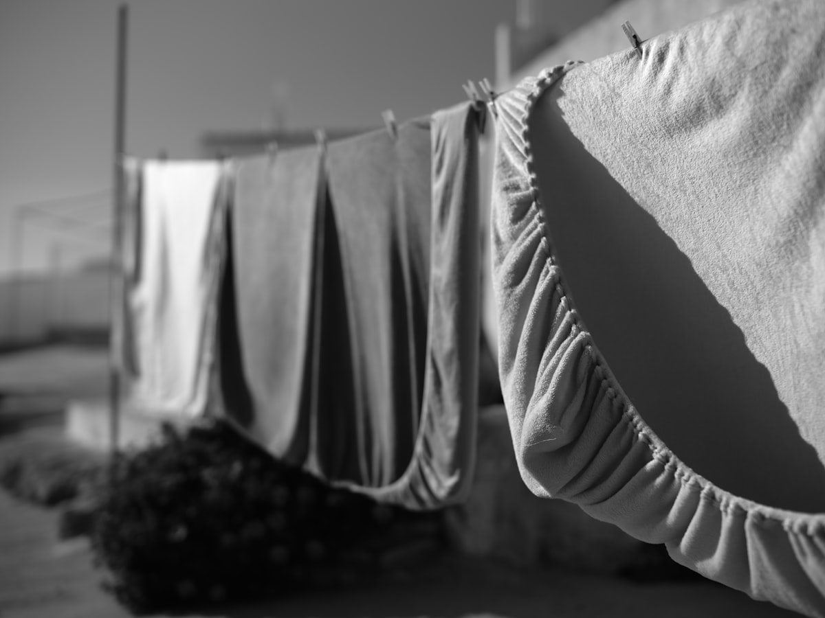 Laundry drying on a clothesline in the sun. related to Twin Size Coverlets