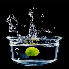 Lemon falling in a bowl of water related to Make a Splash with Bubble Guppies Bedding