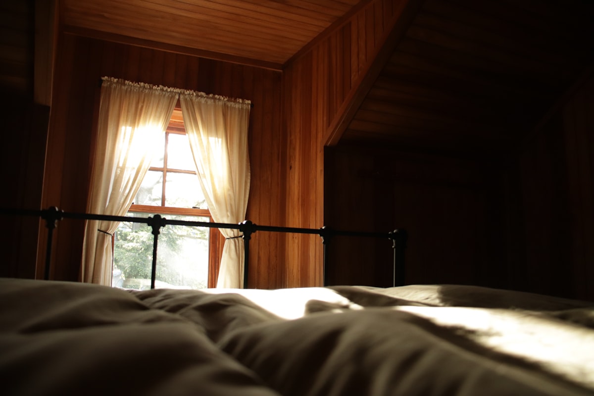 Light from a window being cast onto a soft bed. related to Sleep in Historic Charm: Bed & Breakfasts of Pennsylvania