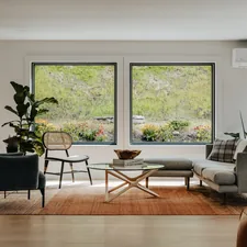 Living room with 2 large windows (IG: @clay.banks) related to Valances for Living Room Windows