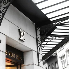 Louis Vuitton shopfront during day related to The Timeless Elegance of Louis Philippe Sleigh Beds