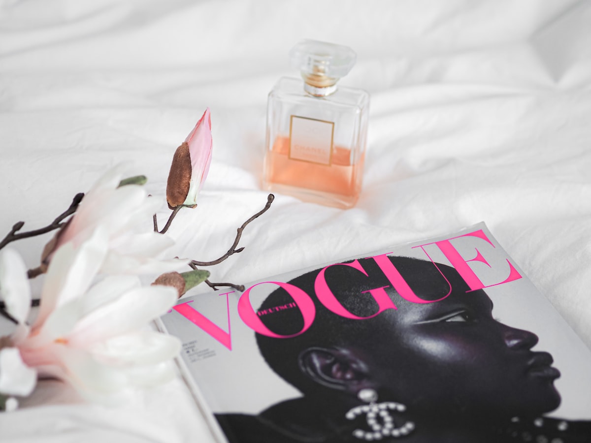 love you perfume bottle on white textile related to Elegant Bedding Inspired by Paris