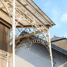 Luxembougish house during a sunny day related to Treasures in Steel: The Elegance of Iron Canopy Bed Frames