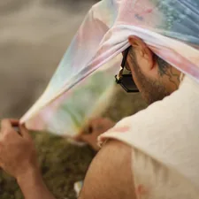 man wearing sunglasse related to 10 Creative Scarf Valance Ideas to Elevate Your Window Style