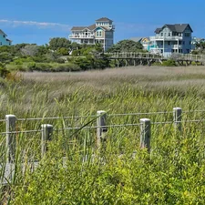 Marsh at the edge of Hatteras Island in North Carolina. related to Experience Coastal Charm at Outer Banks Bed and Breakfasts