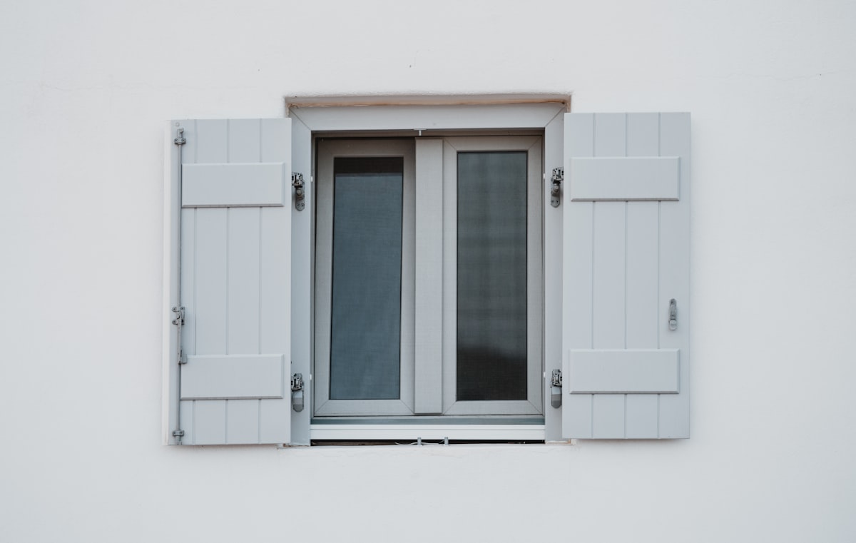 Minimal window and shutters related to Elevate Your Windows with Grey Curtain Valances