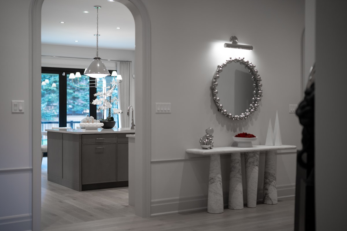 Modern entryway with console table and mirror related to Elevate Your Entryway: Stylish Small Entryway Tables to Welcome You Home