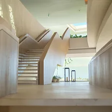 Modern interior with a grand staircase and natural light. related to Smart Solutions for Kids' Bedrooms