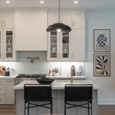 Modern kitchen with island and pendant light. related to Elevate Your Kitchen Style with Modern Kitchen Valances