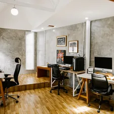 Modern office space with desks and computers related to Enhance Your Space with Attached Valance Curtain Sets