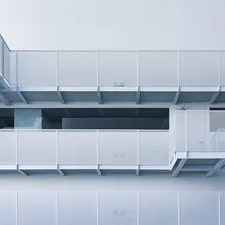 Modern white building with balconies and stairs related to Elegant Loft Beds with Stairs for Modern Bedrooms