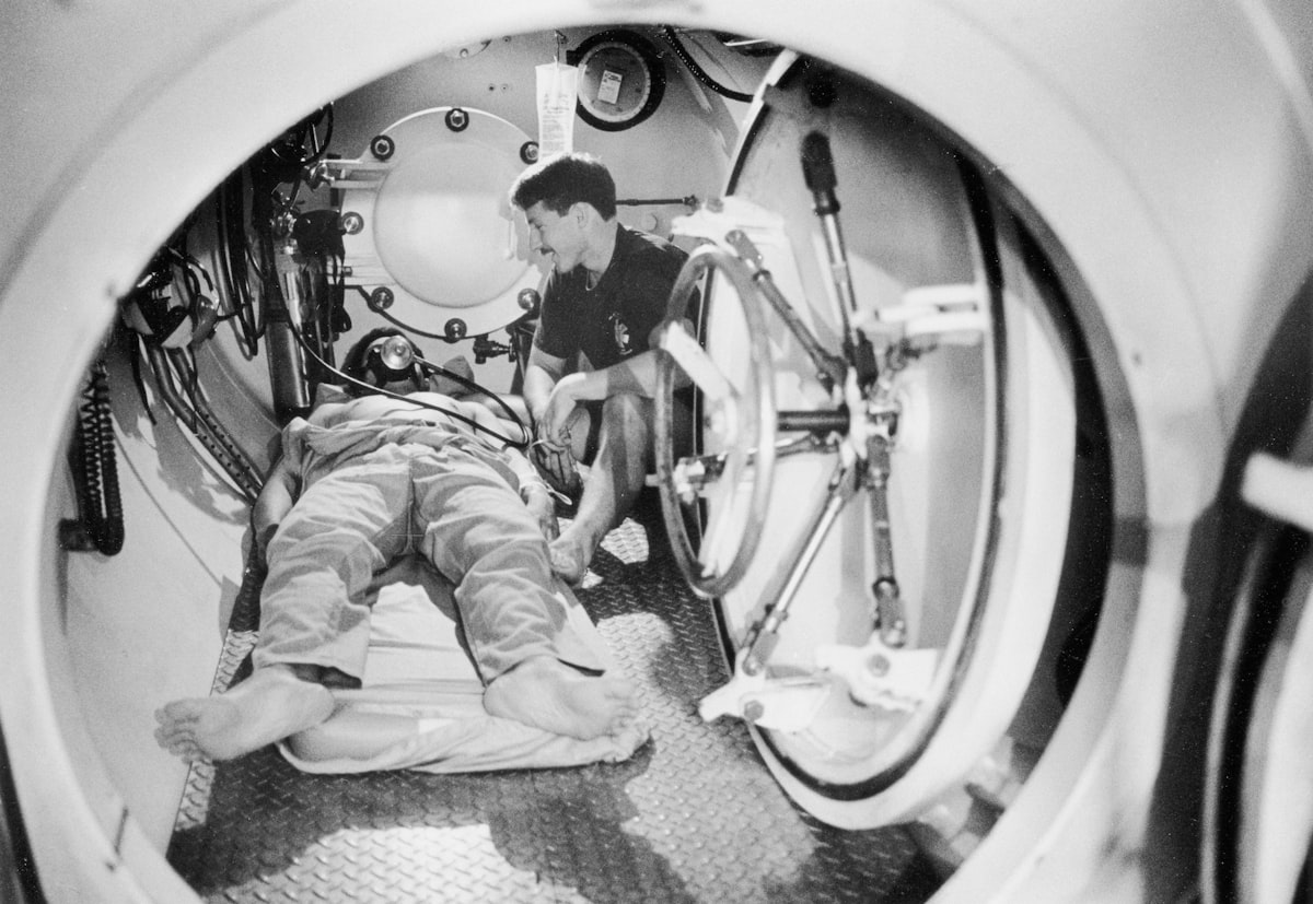 Navy MedicineFollow 15-3001-0569 HM1(DV) John Kuntz and a patient in the diving and salvage unit's decompression chamber at Naval Station's Ship Repair Facility. Technicians at the dive locker say they have been treating an average of 35 cases of the beds each year. [Divers][Patient][Decompression Chamber] "Navy Dive Locker Gives Humanitarian Support" by PHI T. Salois, USN related to Sweeping Deals: Roomba Vacuum at Bed Bath and Beyond