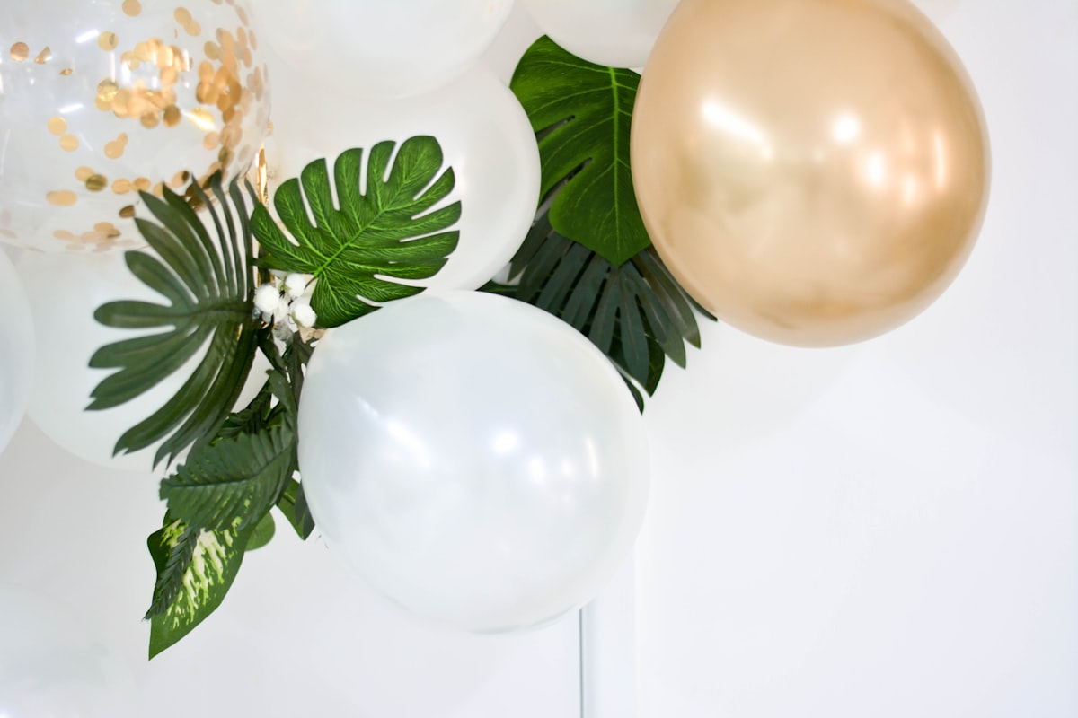 New years gold and white party balloons! related to Elevate Your Decor with Balloon Valance Ideas