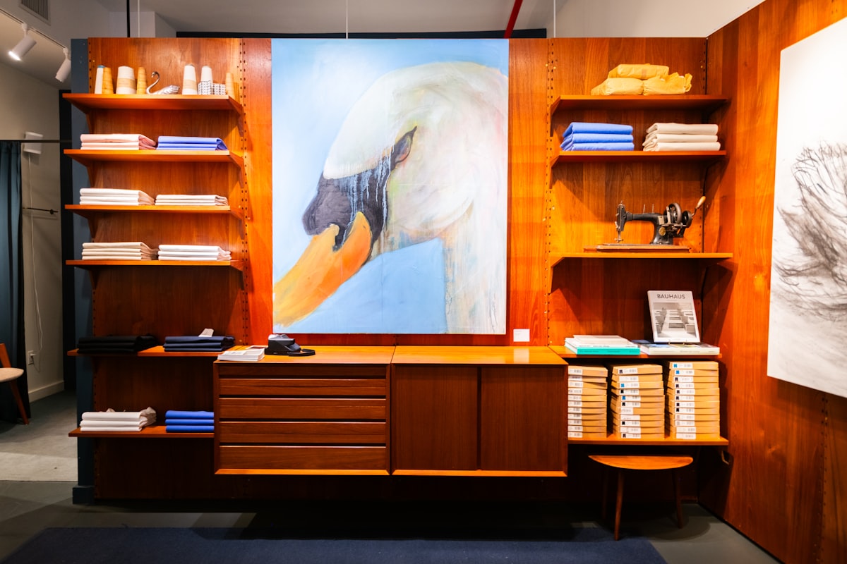 Nicholas Cordeiro swan painting at Merz b Schwanen store in NYC. related to Danish Teak Sideboard with Built-In Storage