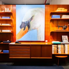 Nicholas Cordeiro swan painting at Merz b Schwanen store in NYC. related to Danish Teak Sideboard with Built-In Storage