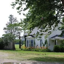 Old white farm house and collapsing barn related to Experience the Best of Ohio Bed and Breakfast