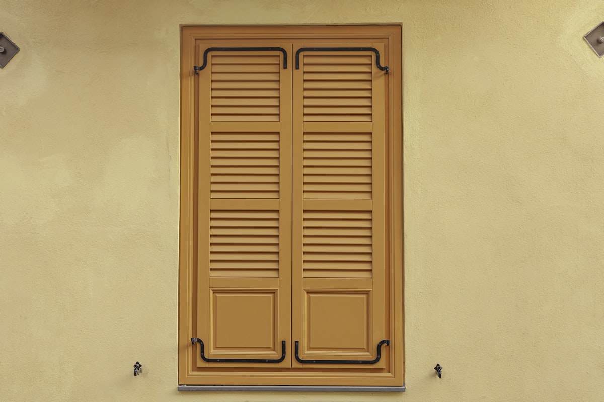 Orange shutters and yellow wall related to Wooden Window Valances