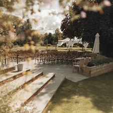 Outdoor ceremony setup at The Old Mill, Aldermaston. Wedding Venue in Berkshire related to Elegant Bed and Breakfast Wedding Venues