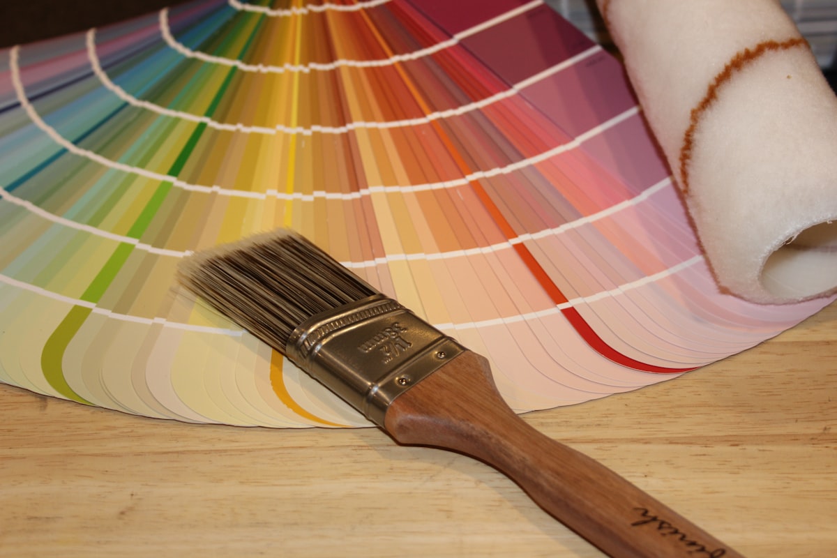 Paint fan and brush. Paint colors related to Welcoming Hues: The Ultimate Guide to Entryway Paint Colors
