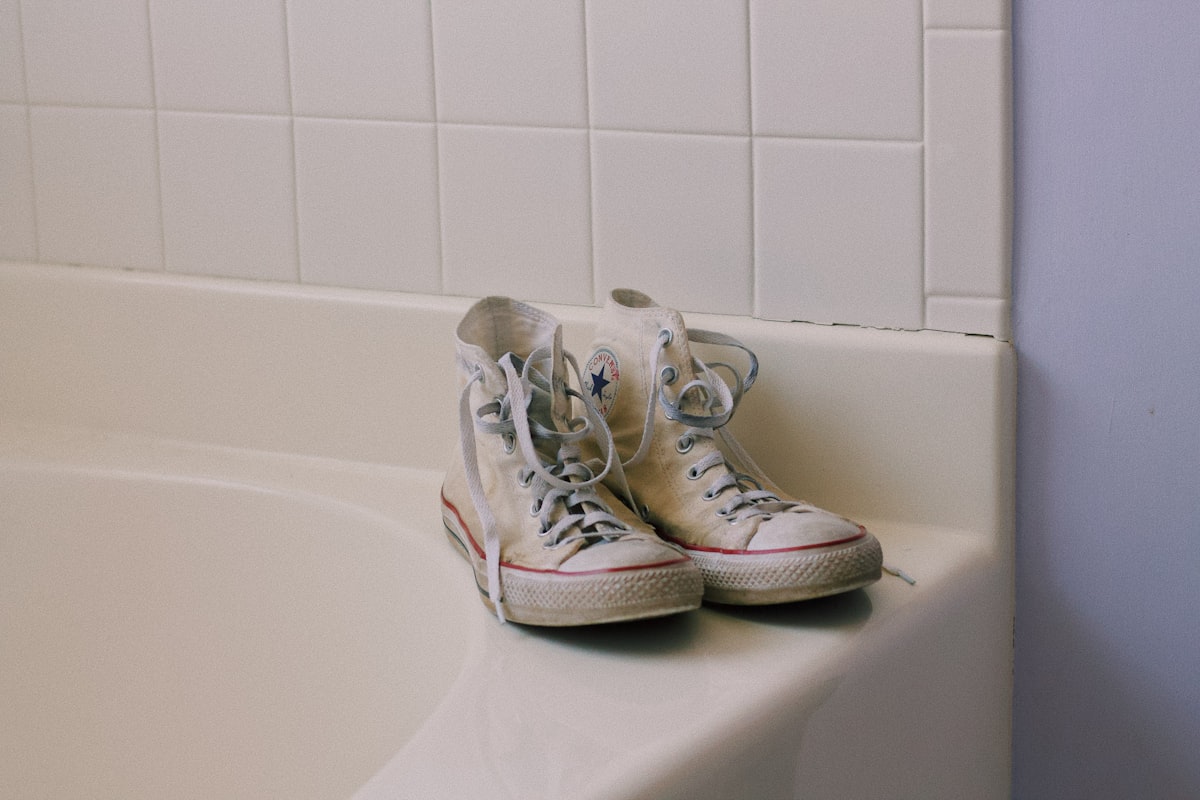 pair of white high-top shoes on sink related to Shower Shoes at Bed Bath & Beyond: The Ultimate Guide for Comfort and Style