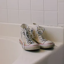 pair of white high-top shoes on sink related to Shower Shoes at Bed Bath & Beyond: The Ultimate Guide for Comfort and Style