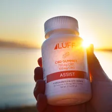 person holding white plastic bottle related to Unlocking the Benefits of L-Arginine Before Bed