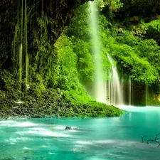 person in black jacket standing on body of water during daytime related to A Beginner's Guide to Sewing a Beautiful Waterfall Valance