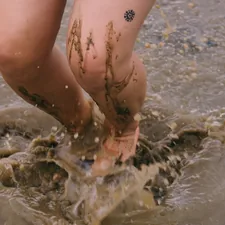 person in water during daytime related to Margaritas, Mud Baths, and More: Explore the Delightful World of the Margarita Machine