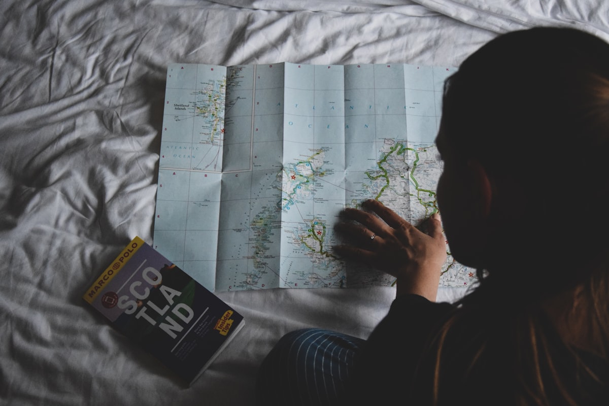 person reading map related to Effective Strategies for Eliminating Bed Bugs: A Comprehensive Guide