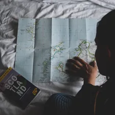 person reading map related to Effective Strategies for Eliminating Bed Bugs: A Comprehensive Guide
