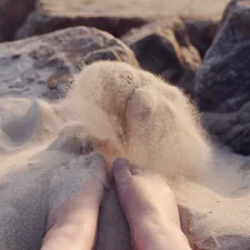 person's feet on sand related to Cozy Up with Sand for Your Chiminea