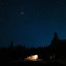 photo of house on forest related to Sleep Under the Stars at Madison's Serene Bed and Breakfasts
