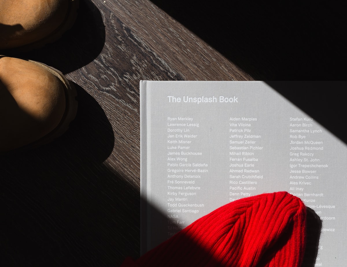 photo of The Unplash book on brown wooden surface related to The Ultimate Guide to Choosing the Perfect Intex Toddler Bed