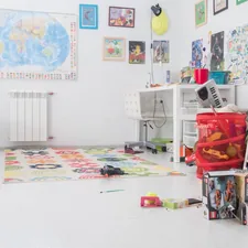 pile of assorted-color toy boxes related to Transforming Little Ones' Spaces: The Magic of Kids' Room Valances