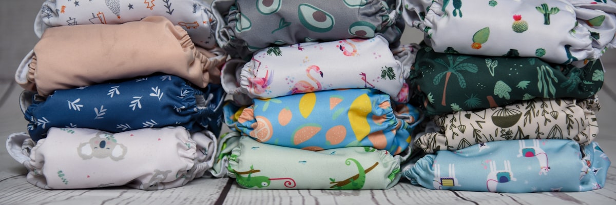 Piles of cloth diapers arranged on a plain background. related to King Size Coverlets on Sale
