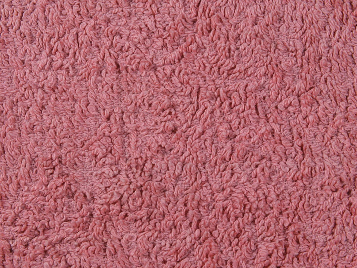 pink towel texture related to Embrace Serene Sophistication with a Coral Colored Coverlet