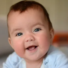 Portrait of a baby smiling
Retrato de un bebé sonriendo related to Choosing the Perfect Baby Boy Nursery Bedding Sets for a Dreamy Nursery