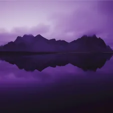 Purple mountains reflected in calm water related to Elegant Purple Valances to Enhance Your Bedroom Decor