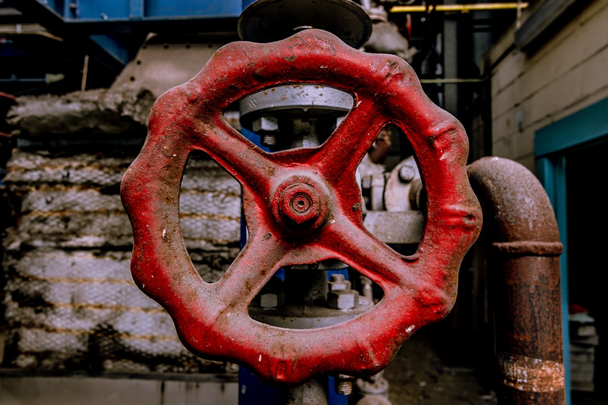 red and black metal tool related to The Ultimate Guide to Cast Iron Chiminea Parts