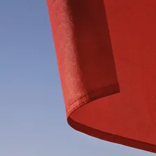 red textile under blue sky during daytime related to Elevate Your Home Decor: Solid Red Curtain Valance Ideas